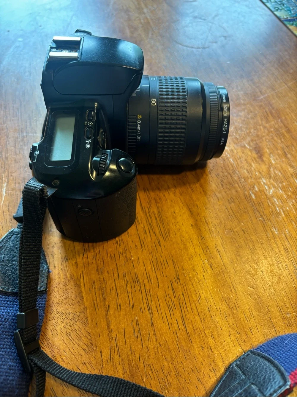Canon Rebel X Black DSLR Camera with Navy and Red Strap